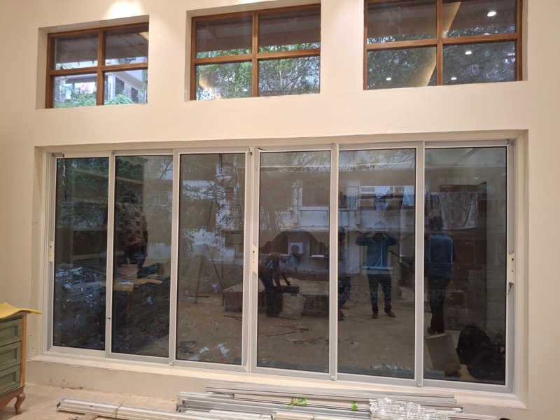 Aluminium sliding partition installation by Vishwa Windows