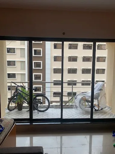 Aluminium sliding window living room Mumbai by Vishwa Windows