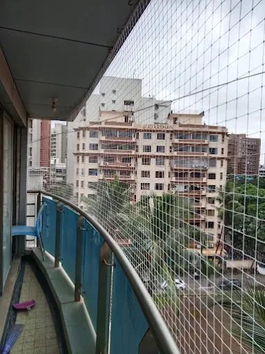 Balcony pigeon net installation Mumbai by Vishwa Windows