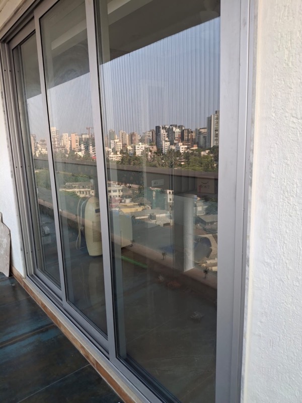 Balcony sliding door hardware repairs by Vishwa Windows