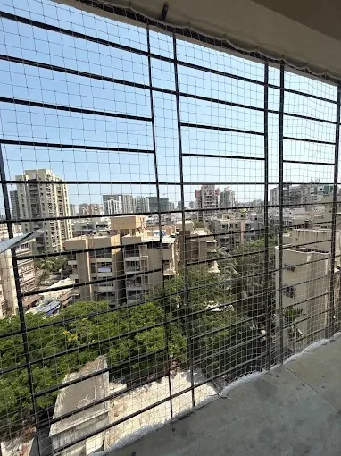 Highrise balcony pigeon net Mumbai by Vishwa Windows