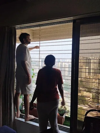 Invisible grill installation balcony Mumbai by Vishwa Windows