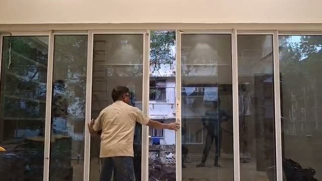 Video: Aluminium sliding folding glass door installation Mumbai by Vishwa Windows