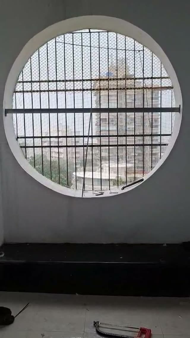 Video: Round window grill pigeon net installation Mumbai by Vishwa Windows