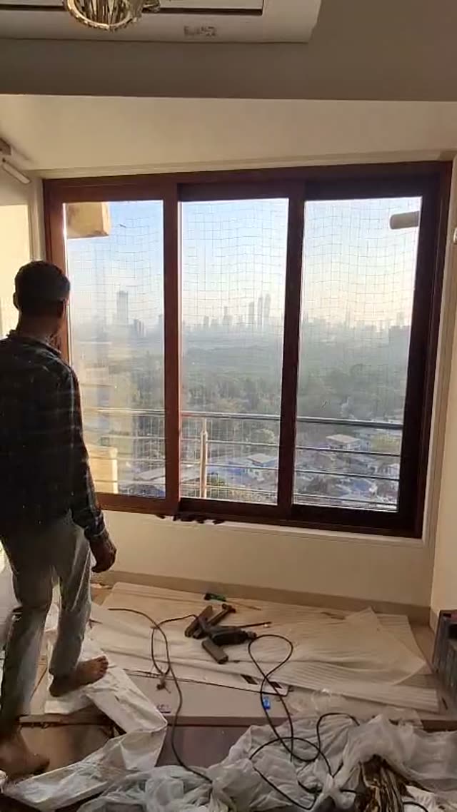 Video: Wooden finish sliding window pigeon net Mumbai by Vishwa Windows