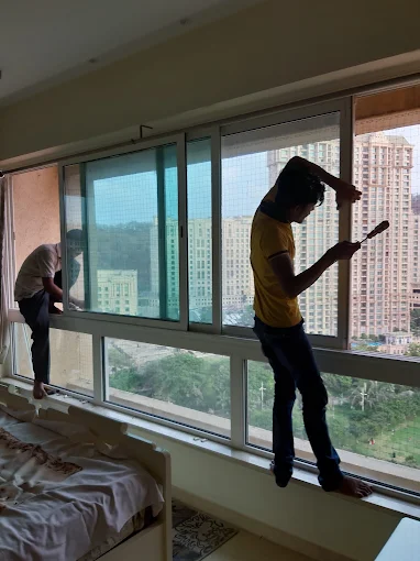 Sliding window repair living room Mumbai by Vishwa Windows